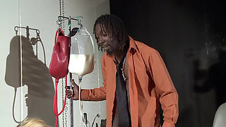 Blond submissive slut gets persecution in the dungeon by lesbian mistress and black power man master Dominus.