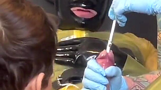 Sounding and Anal Stretching Double Domme in Latex with Madame Li Ying and Our Rubber Gimp