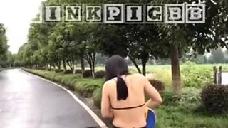 Asian prostitute walking on the street