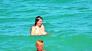 Shameless amateur fisted on a public beach