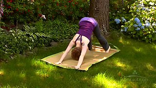 Eliza trys out yoga, hairy style in this outside videos, sure to