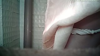 Pale skin lovely female thoroughly wipes her pussy in the toilet