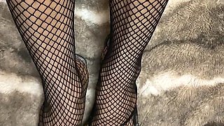 Fishnet in Open Toe Shoes with Red Nail Polish