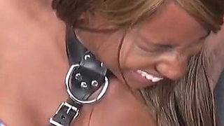 A Blonde Nastily Tickles a Black Girl