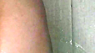 MILF in the Bathroom Playing with a Dildo