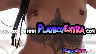 Petite ebony beauty flaunts her tattoos