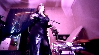 Mistress Eva in latex dominates as a milf queen with big booty in solo femdom session