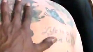 Tattoed Slut Gets a Huge Black Cock in Her Ass