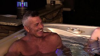 DILF gets nude with 3 sexy twinks in his hot tub