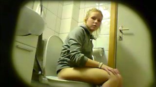 Hidden cam video of cute blonde girlie of mine pissing in the toilet