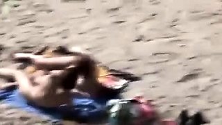 A Voyeur Films A Couple On Beach