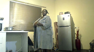 Black Mature Woman Booty Flashing and Boobs Tease