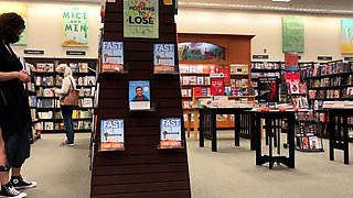 AMwednesday - flashing in a book shop