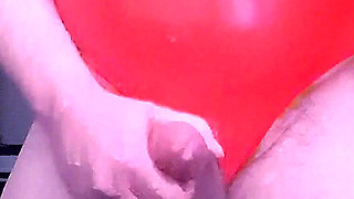 Chubby grandpa wearing red latex bodysuit wanking a semi and cumming for 3 minutes plus