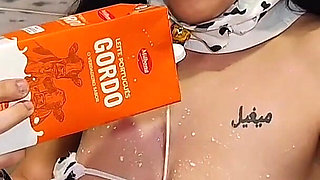 Pouring Cold Milk Over the Cow Mooing Large Cow Udders