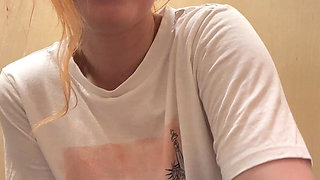 Fitting Room Observation of Young Redhead Woman