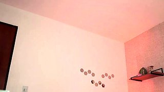 Busty curly brunette with big boobs fucks on couch