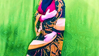 Desi Pakistani married woman wearing saree