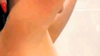 Busty curly brunette with big boobs fucks on couch