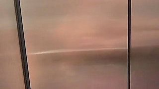 Naughty Elevator Ride Will She Get Caught?