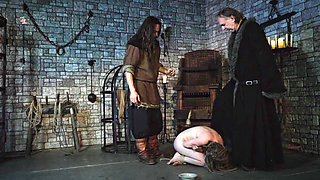 A Wild Naked Witch Is Given a Juicy Bone to Gnaw on Before She Is Hoisted up to Be Teased and Drips From Every Hole