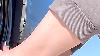 67 Tall Amazon Goddess Changes Her Tire - Big Feet in Frame