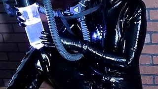 Kinky solo session with MILF freak in full body latex suit