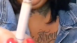 BBW in Her Jacket, Smoking a Cigarette and Being Sexy
