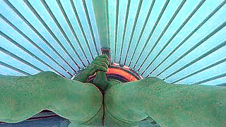 Masturbating in public tanning bed