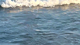 Try Not to Wet My Hair While Play with the Waves