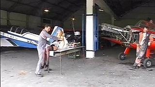 Workers with hard cock fucking the ass of a sexy blonde in black stockings