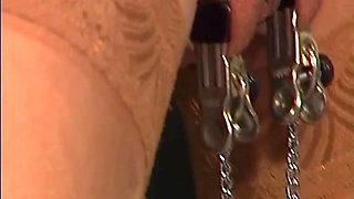Mature Brunette MILF Bound with Weighted Nipple Clamps
