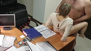 Hot office secretary sucks and rides her boss on the desk