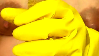 Indian Pregnant Stepsister in Yellow Gloves Plays with a Dildo and Talks Dirty
