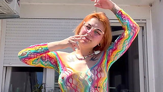 Smoking in a Rainbow Fishnet on the Balcony