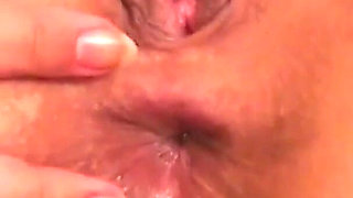 Amber Grecov dresses as a nurse fucks her anus pushing the toys deeper and deeper