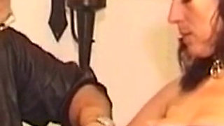 Mature Brunette Submits to Bondage with Two Men