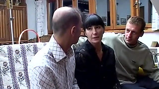 Cute brunette banged by two members of her own flat