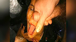 Bukkake Slut with Glasses Gets Her Face Drenched in Cum