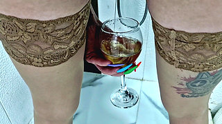 Piss games. Dominatrix Nika pees in a glass, then lets him smell her panties and lets the slave drink the entire glass to the la