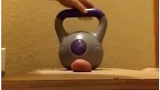 Wife Crushes Balls With Kettle Bells