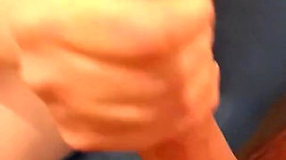 A Voyeuristic Stepmother in Tights Jerks off a Young Man and Receives His Sperm in Her Mouth.