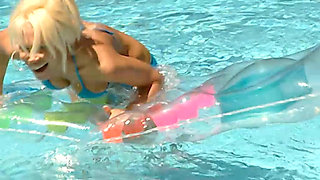 Stunning Woman Strips in the Pool