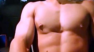 Big-Cocked Man Strokes in Car While Watching Porn