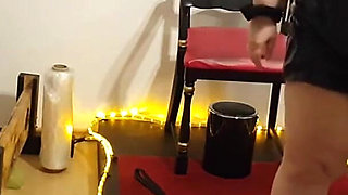 Busty Dominatrix Drenches Bound Slave in Sloppy Golden Shower