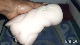 Toy cumshot in-between feet...