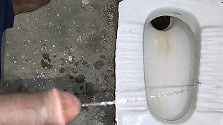 Desi Bhabhi Holding Stepbrother-in-law's Penis and Making Him Pee and Peeing Herself