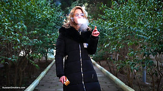 Absolutely Stunning Lady Is Smoking 120mm Saratoga Cigarette in the Park