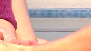 Sexy blonde skinny teen Jasmine giving footjob to stepbrother