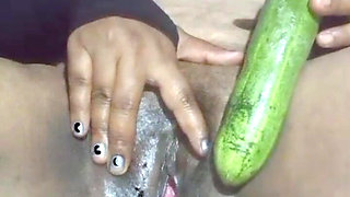 Today, Indian Bhabhi Quenched Her Desire by Inserting a Cucumber Into Her Pussy
